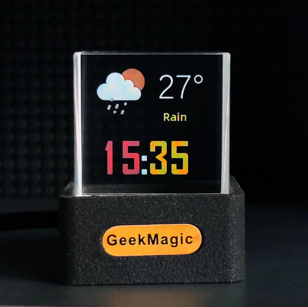 GeekMagic HelloCubic Lite transparent glass cube showing weather and time